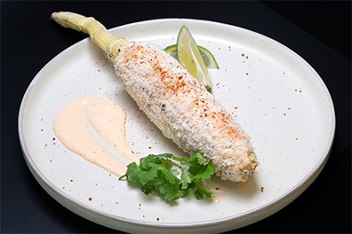 Grilled Elotes, a starter dish served at our Barclay-Kingston, Cherry Hill burrito restaurant.