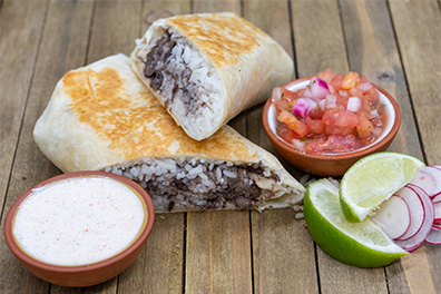 Beef Burrito near Woodcrest, Cherry Hill cut in half.