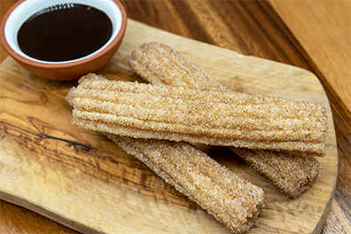 Churros with Chocolate Dipping Sauce, a dessert great to have after Woodcrest, Cherry Hill burritos.