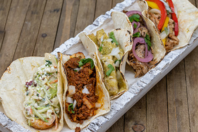 A group of tacos prepared for the best Mexican food takeout near Barclay-Kingston, Cherry Hill, New Jersey.