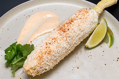 Grilled Elotes appetizer made for Barrington Mexican food delivery.