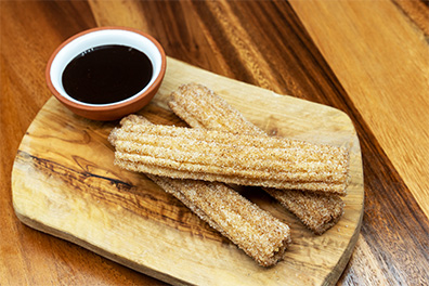 Fresh Churros with Chocolate Dipping Sauce made at our Barclay-Kingston, Cherry Hill Mexican restaurants.